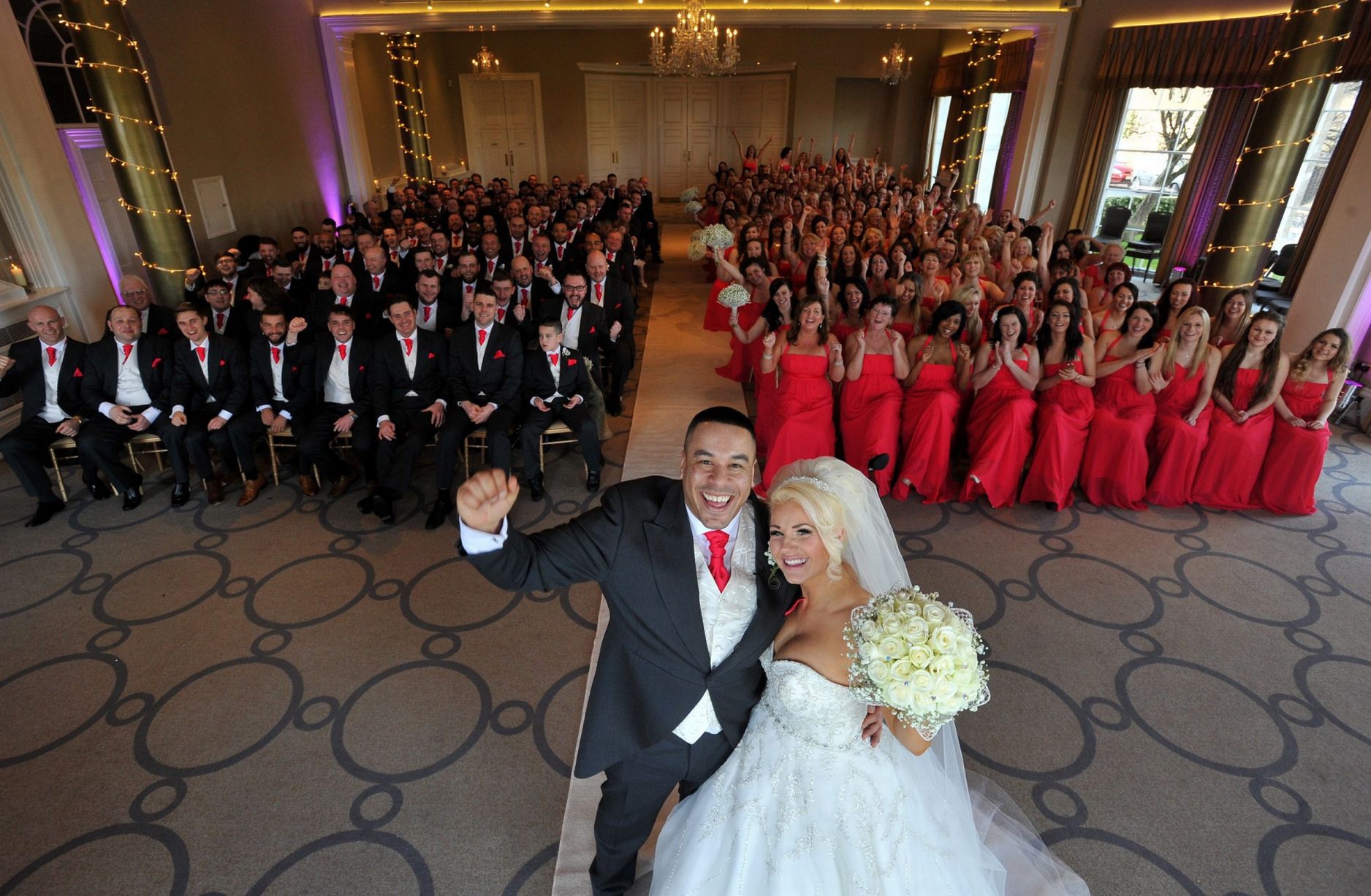 wow-couple-breaks-guinness-world-records-with-130-bridesmaids-and-100