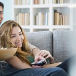 Couple watching TV together