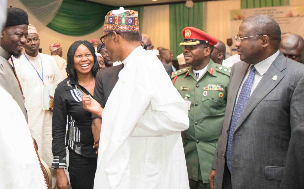 L-R; President, Women Arise, DrJoe Okei Odumakin; President of Federal Republic of Nigeria, His Excellency, President Muhammadu Buhari & others.