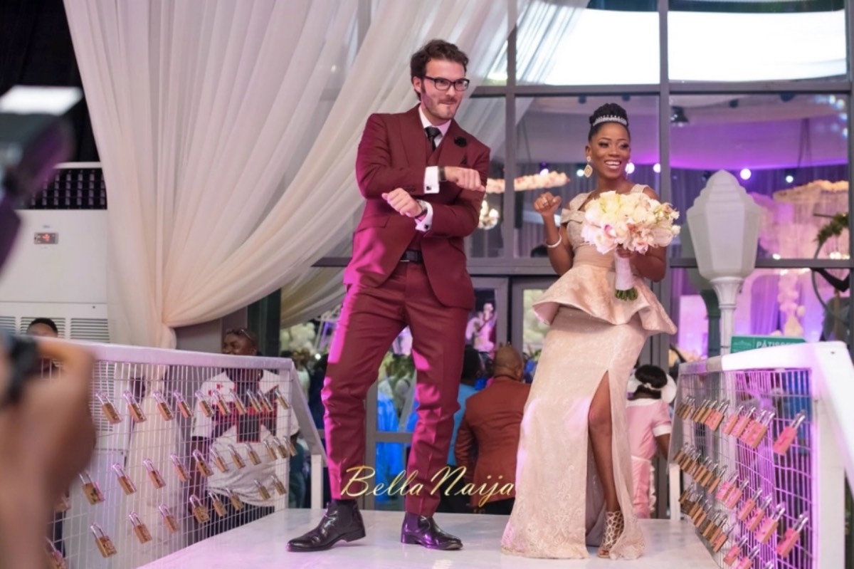Tosyn Bucknor and her husband dance at their wedding