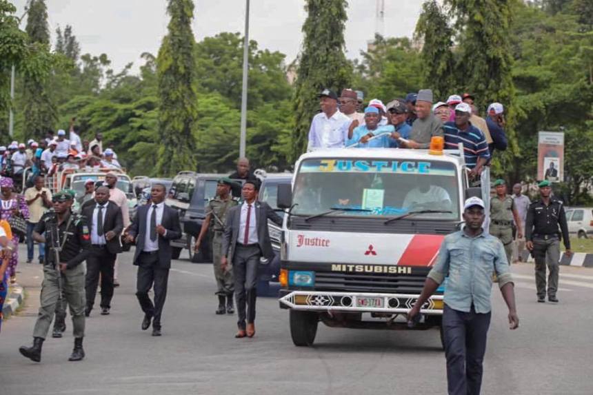 Police teargas PDP leaders, Senate President Bukola Saraki, Senator Ben-Murray Bruce, Senator Dino Melaye, former Jigawa Governor Sule Lamindo, the party chairman, Uche Secondus, Speaker of the House Yakubu Dogara, Governor of Sokoto, Aminu Tambuwal when they staged a protest for a free and fear election at the INEC office in Abuja on October 5, 2018