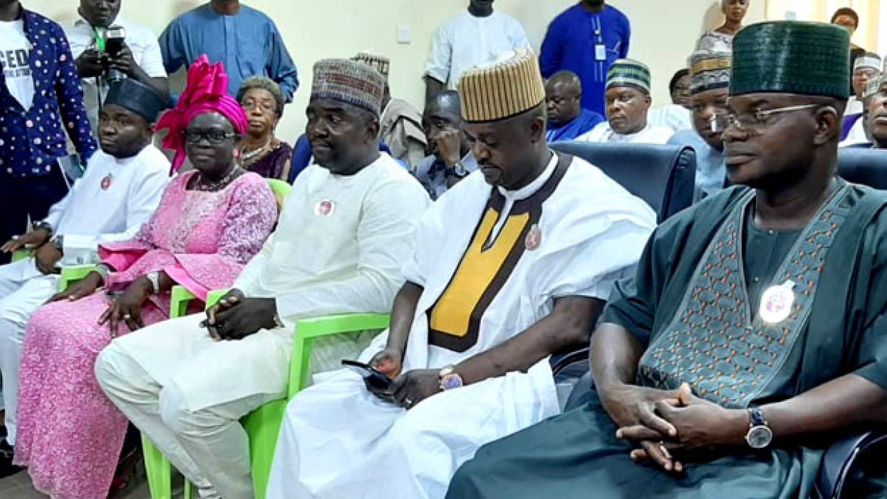 Yahaya Bello (right) and his deputy, Edward Onoja at the office of the Independent National Electoral Commission, INEC, office to receive their certificates of return on Thursday, November 21, 2019