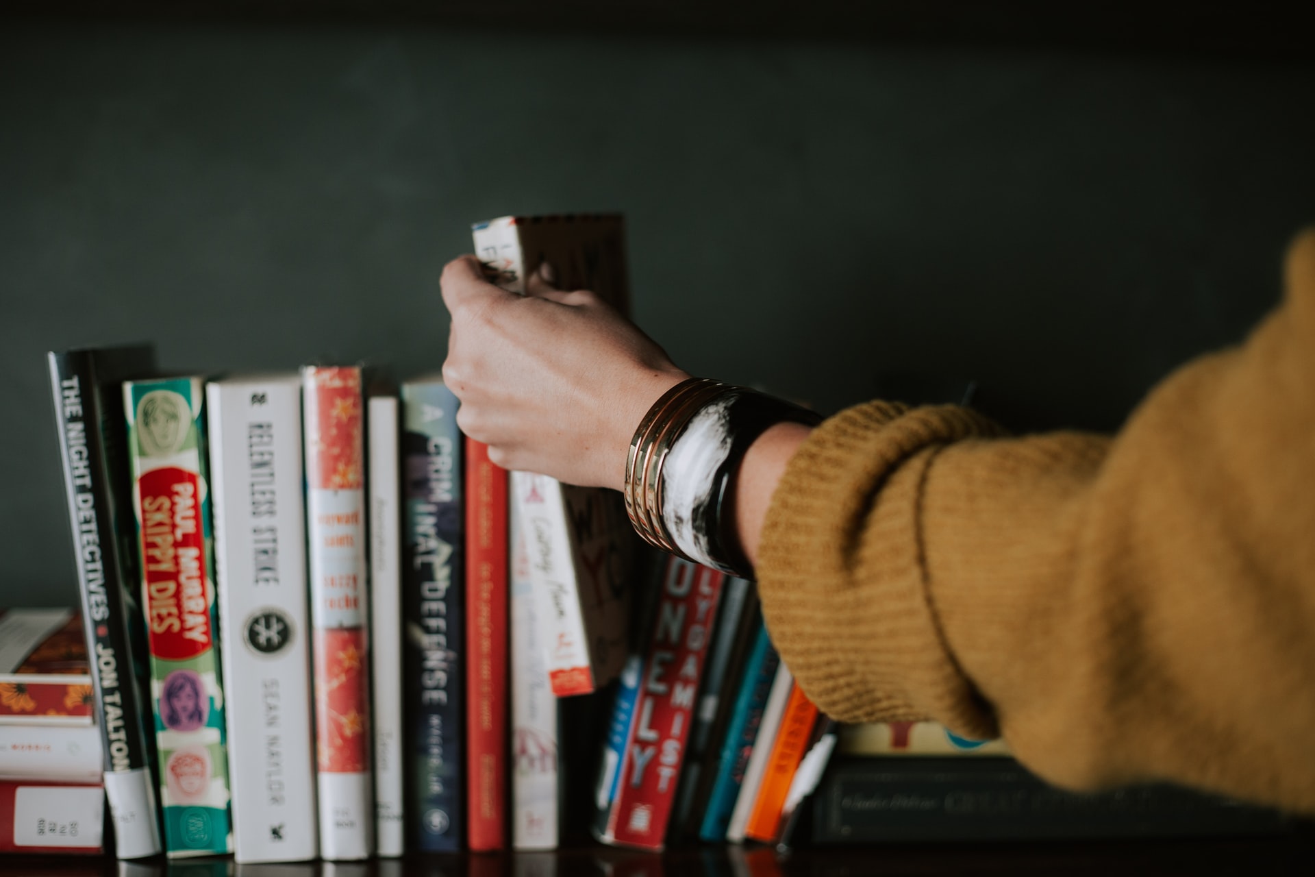 woman reading books bookshelf, wisdom