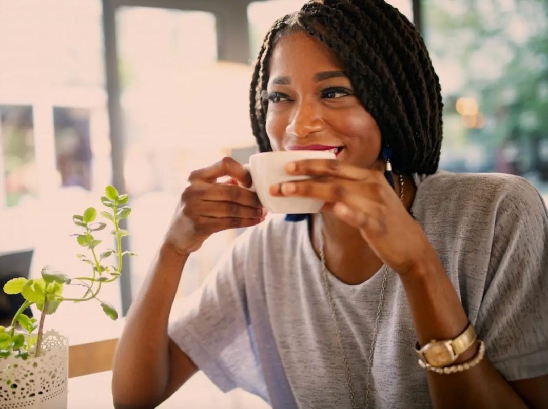 social media use, types of tea black woman drinking coffee tea, teas benefits