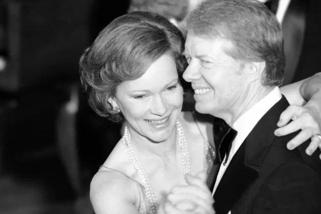 President Jimmy Carter and his wife, Rosalynn, dance at the annual Congressional Christmas Ball at the White House