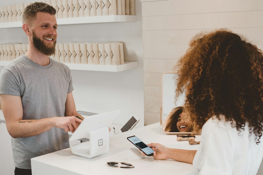 A customer making a purchase at a business.