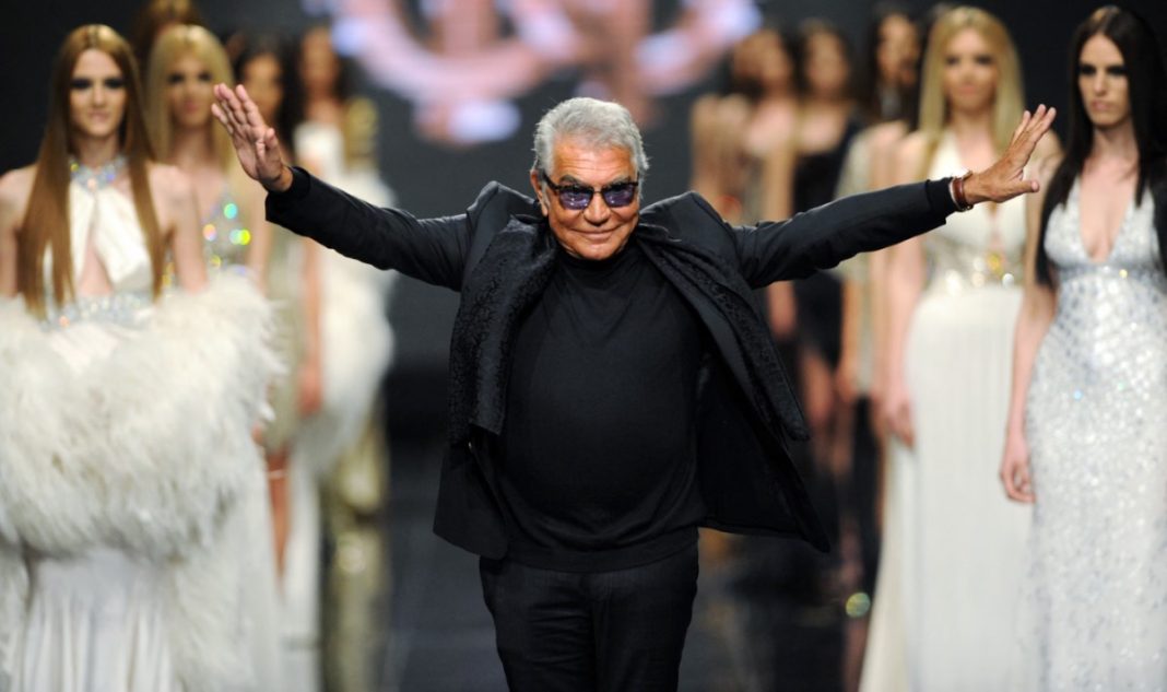 Italian fashion designer Roberto Cavalli attends his fashion show on late evening, June 10, 2013, in the Montenegrin coastal town of Budva. Savo Prelevic/AFP via Getty Images