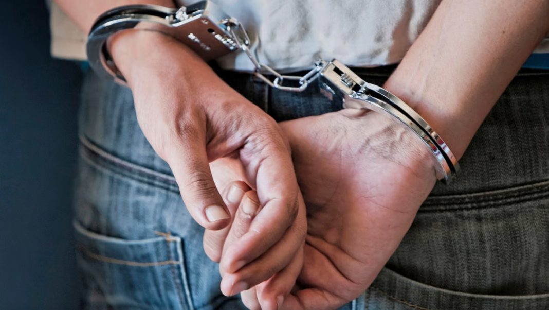 husband, Woman Arrested handcuffed, jailed, handcuff