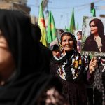 Iran women protest  2022-09-27T220522Z_1_LYNXMPEI8Q11O_RTROPTP_4_IRAN-WOMEN-SYRIA-scaled