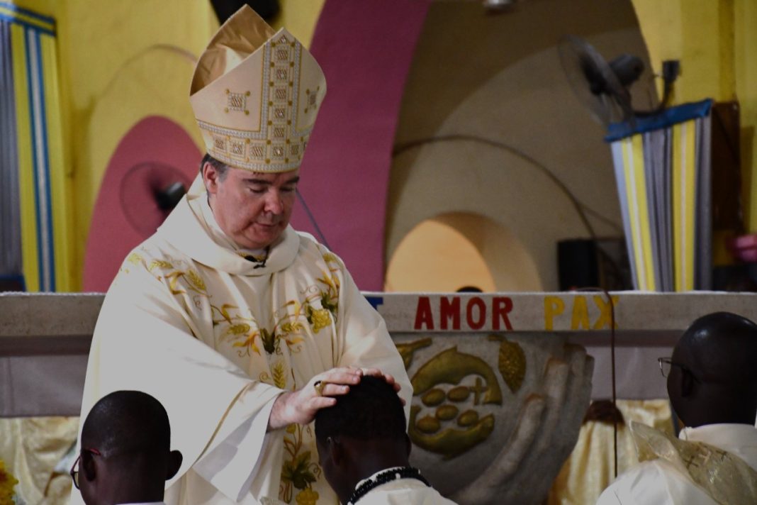 Archbishop Michael Francis Crotty ministers at a Catholic Mass in Africa in an undated photo New Ambassador, Pope Francis