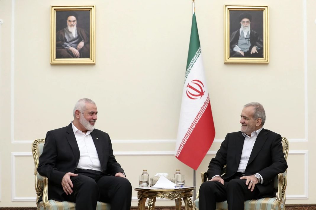 Ismail Haniyeh, In this photo released by the Iranian Presidency Office, President Masoud Pezeshkian, right, meets Hamas chief Ismail Haniyeh, at the President’s office in Tehran, Iran, Tuesday, July 30, 2024. (Iranian Presidency Office via AP)