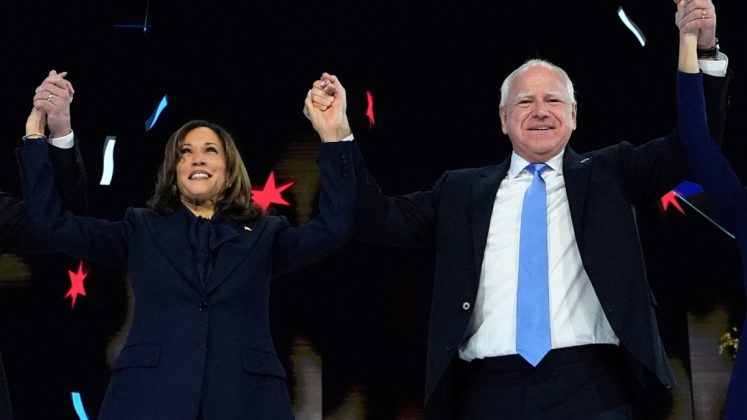 Vice President Kamala Harris and presidential campaign running mate Tim Walz are pictured together