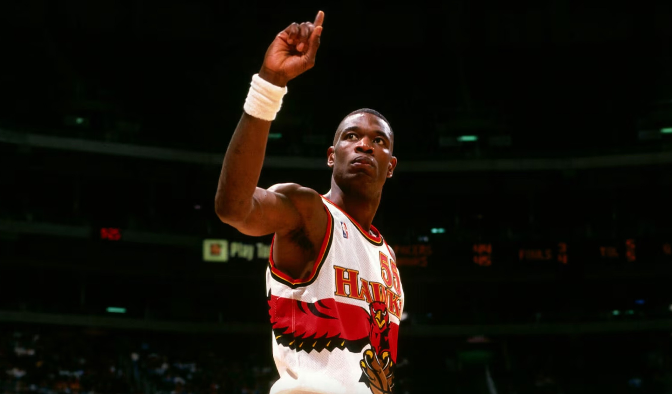 Dikembe Mutombo on the court during his days with the Hawks. | Getty Images