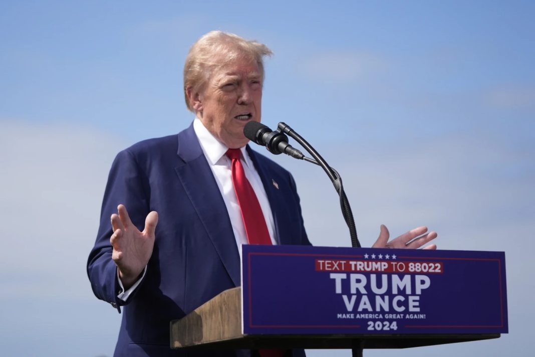 Laura Loomer, Republican presidential nominee former President Donald Trump speaks during a news conference held at Trump National Golf Club Los Angeles in Rancho Palos Verdes, California on Friday, September 13, 2024. | AP/Jae C. Hong