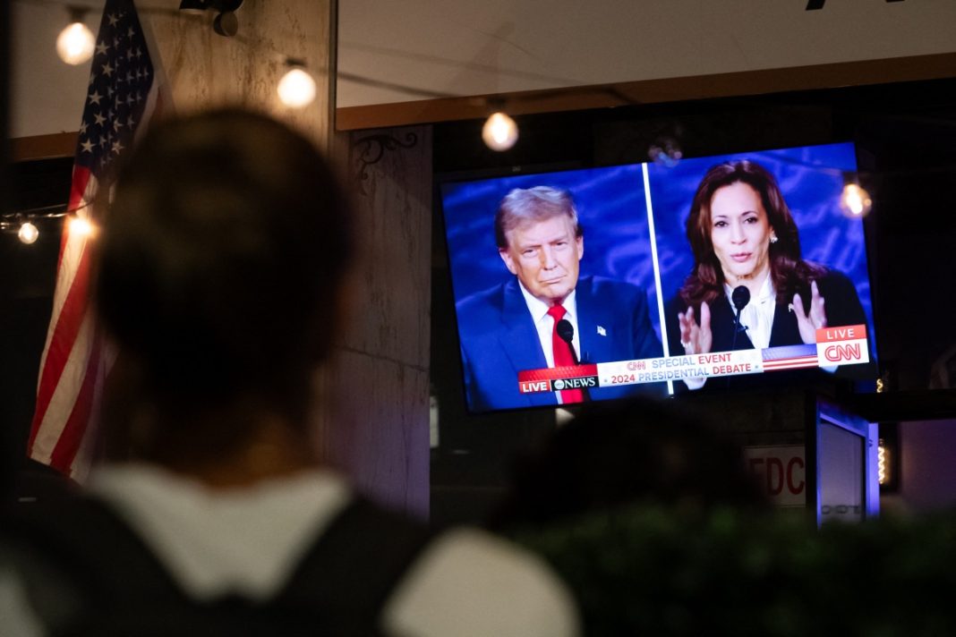 Election Day, A screen displays the US Presidential debate between Vice President and Democratic presidential candidate Kamala Harris. Another head-to-head is being considered by Trump's campaign. Allison Bailey/Getty Images