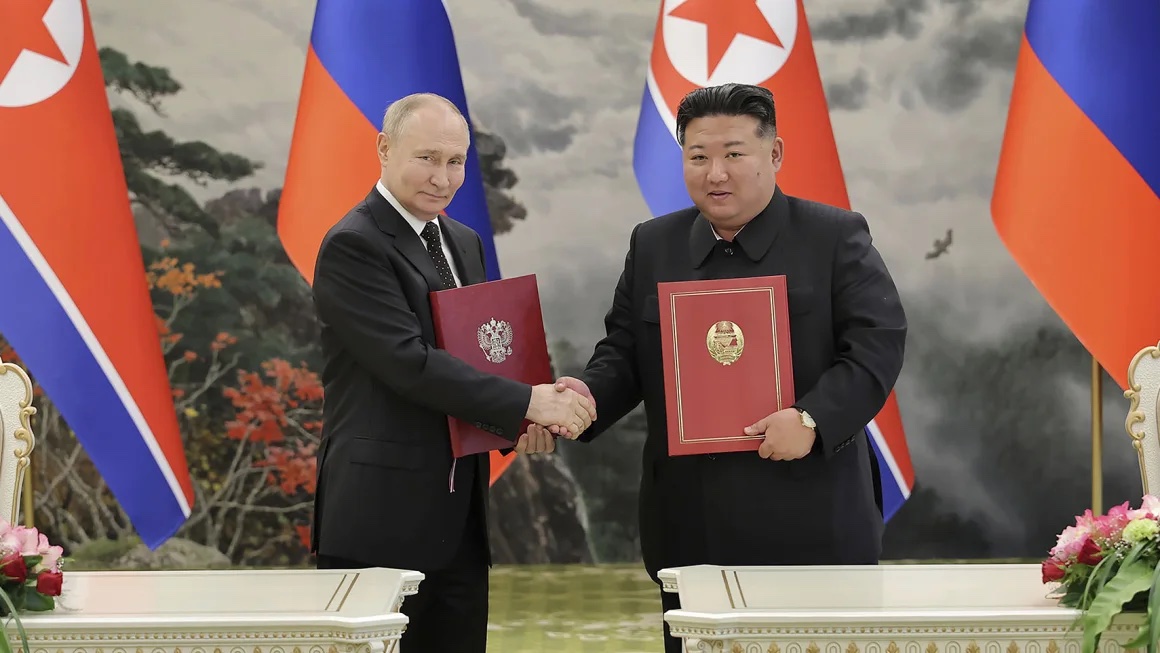 North Korean leader Kim Jong Un and Russia's President Vladimir Putin shake hands after signing a comprehensive strategic partnership in Pyongyang, North Korea in June this year. KCNA/AP