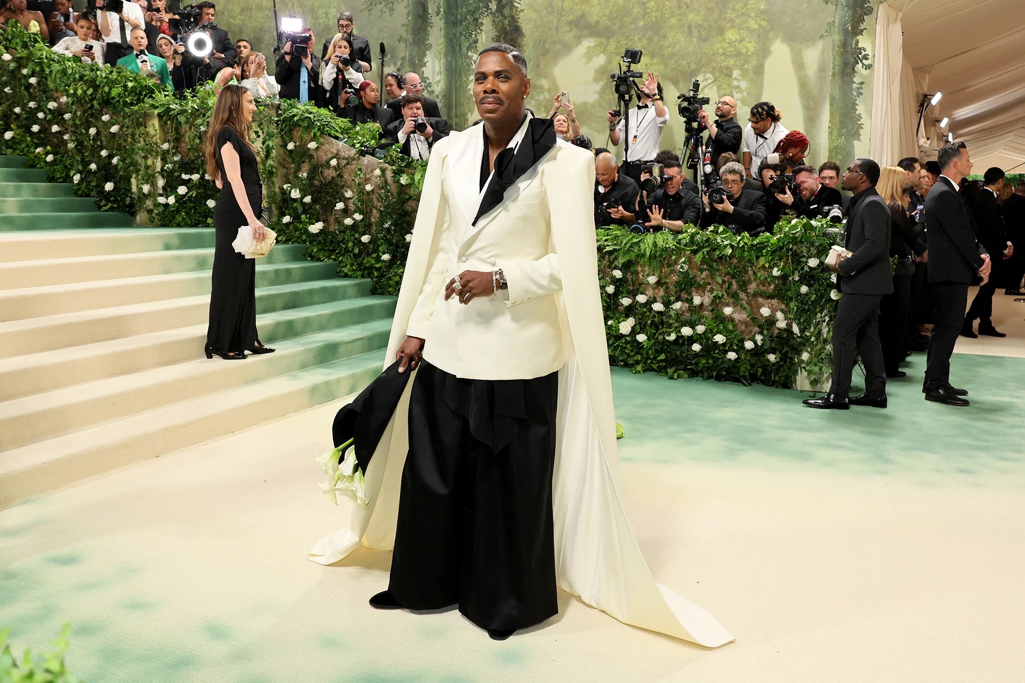 Colman Domingo was a highlight of the 2024 Met Gala red carpet in a show-stopping Calla lily look by Willy Chavarria. Now, the actor will step up as a co-chair of the 2025 event. | Dia Dipasupil/Getty Images 