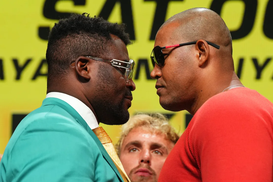 Francis Ngannou faces off with Renan Ferreira during the Battle of the Giants press conference at The Anthem on August 22 in Washington DC. Cooper Neill/Getty Images  