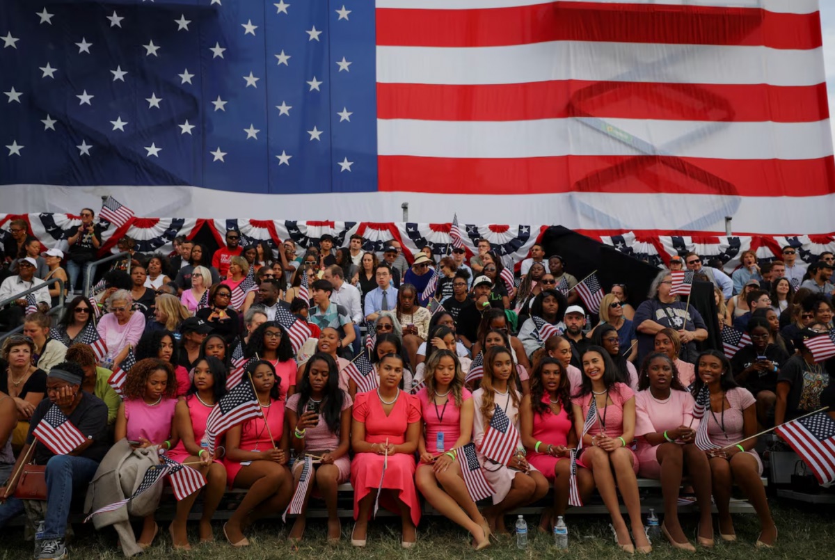 Supporters of Democratic presidential nominee U.S. Vice President Kamala Harris gather prior to her delivering remarks, at Howard University