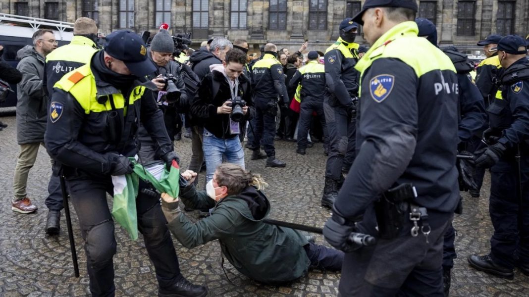 Dozens of pro-Palestinian demonstrators have been detained by police in Amsterdam after defying a ban on public protests in the Dutch capital.