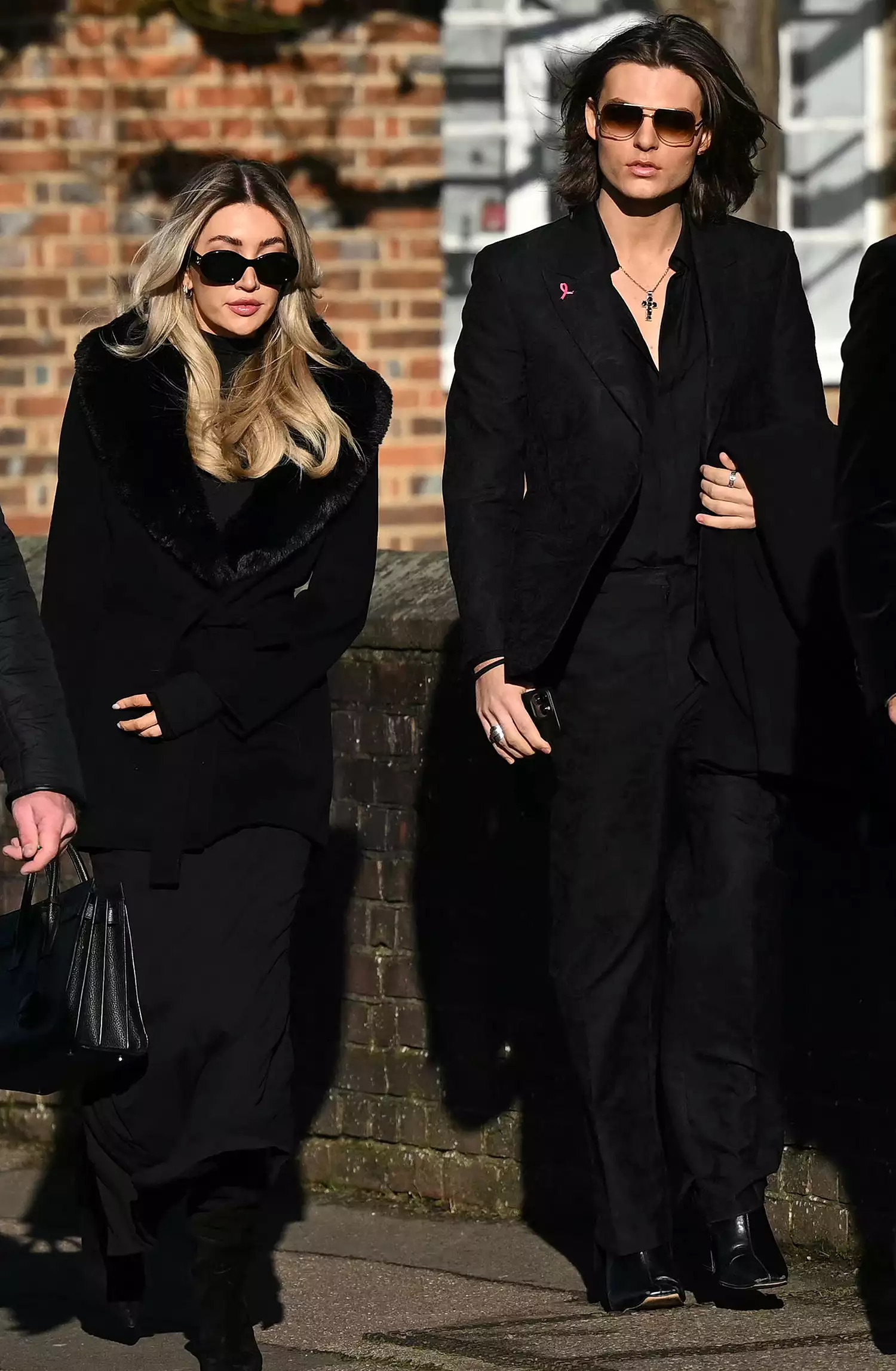 Kate Cassidy and Damian Hurley attend the funeral service for One Direction bandmate, Liam Payne, held at St Mary’s Church, Amersham, northwest of London on Wednesday, November 20, 2024. | Justin Tallis/AFP via Getty   