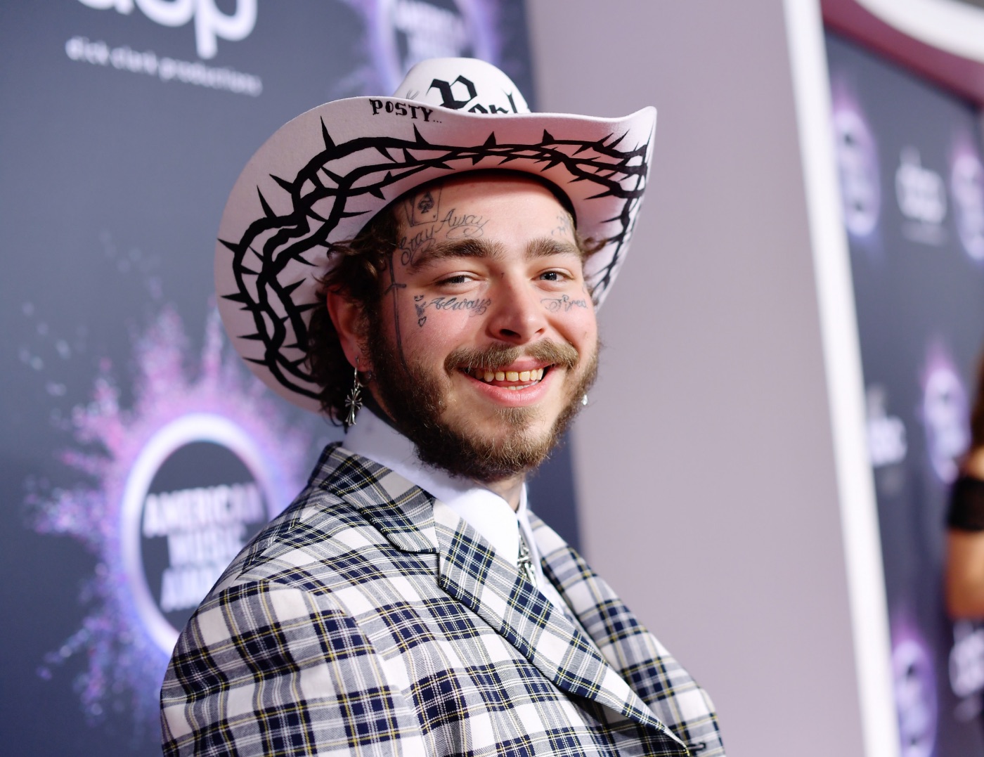 Post Malone attends an awards ceremony in Los Angeles on November 24, 2019. | Matt Winkelmeyer/Getty Images for DCP