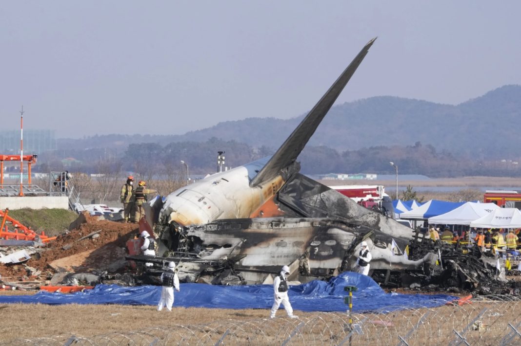 Jeju, Plane, Firefighters and rescue team members work near the wreckage of a passenger plane at Muan International Airport in Muan, South Korea, Sunday, December 29, 2024. | AP Photo/Ahn Young-soon