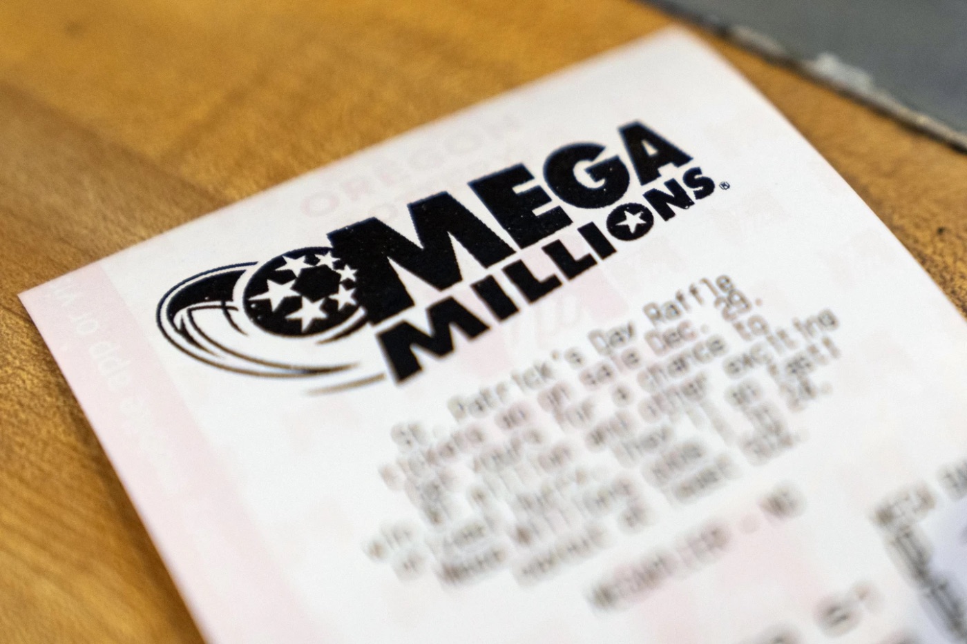 A Mega Millions lottery ticket is displayed at a store on Thursday, December 26, 2024, in Tigard, ore. | AP Photo/Jenny Kane  