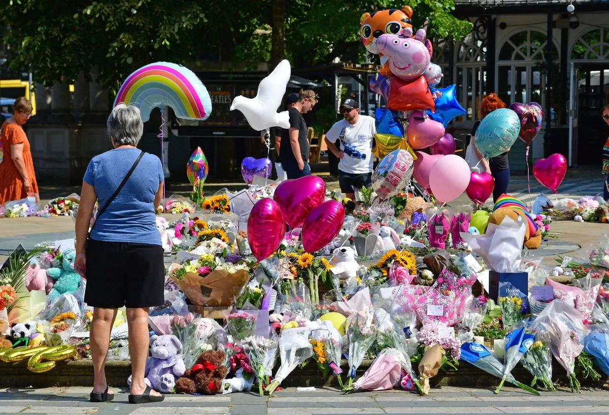 Southport knife attack tributes in the town centre after the brutal murders ( Image: Colin Lane/Liverpool Echo)