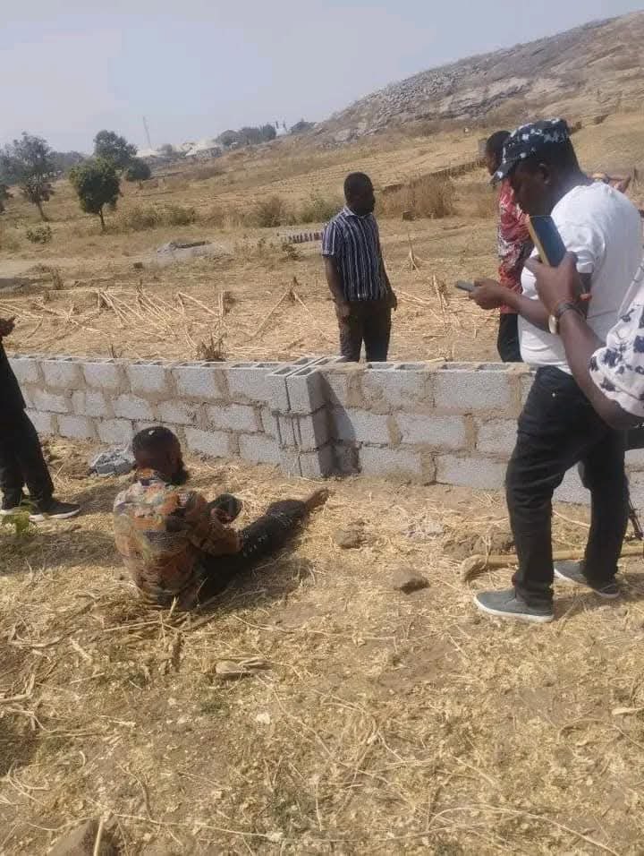 Timileyin Ajayi is pictured at the point of his arrest in Ozobo, Abuja