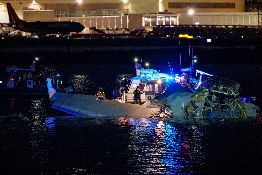 Emergency response units assess airplane wreckage in the Potomac River near Ronald Reagan Washington Airport on January 30, 2025, in Arlington, Virginia. | Andrew Harnik/Getty Images