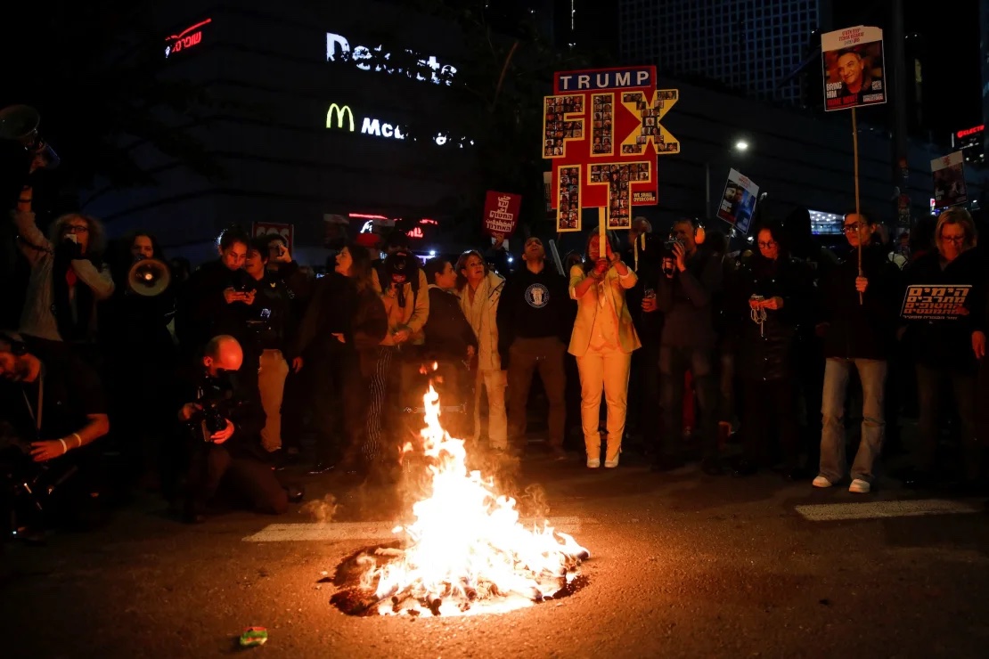 Protesters in Tel Aviv, Israel, on February 10, 2025. | Shir Torem/Reuters