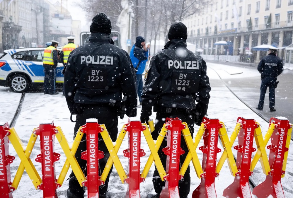 Police officers stand in front of the Hotel Bayerischer Hof before the 61st Munich Security Conference in Munich, Germany, Friday, Feb. 14, 2025. | Sven Hoppe/dpa via AP