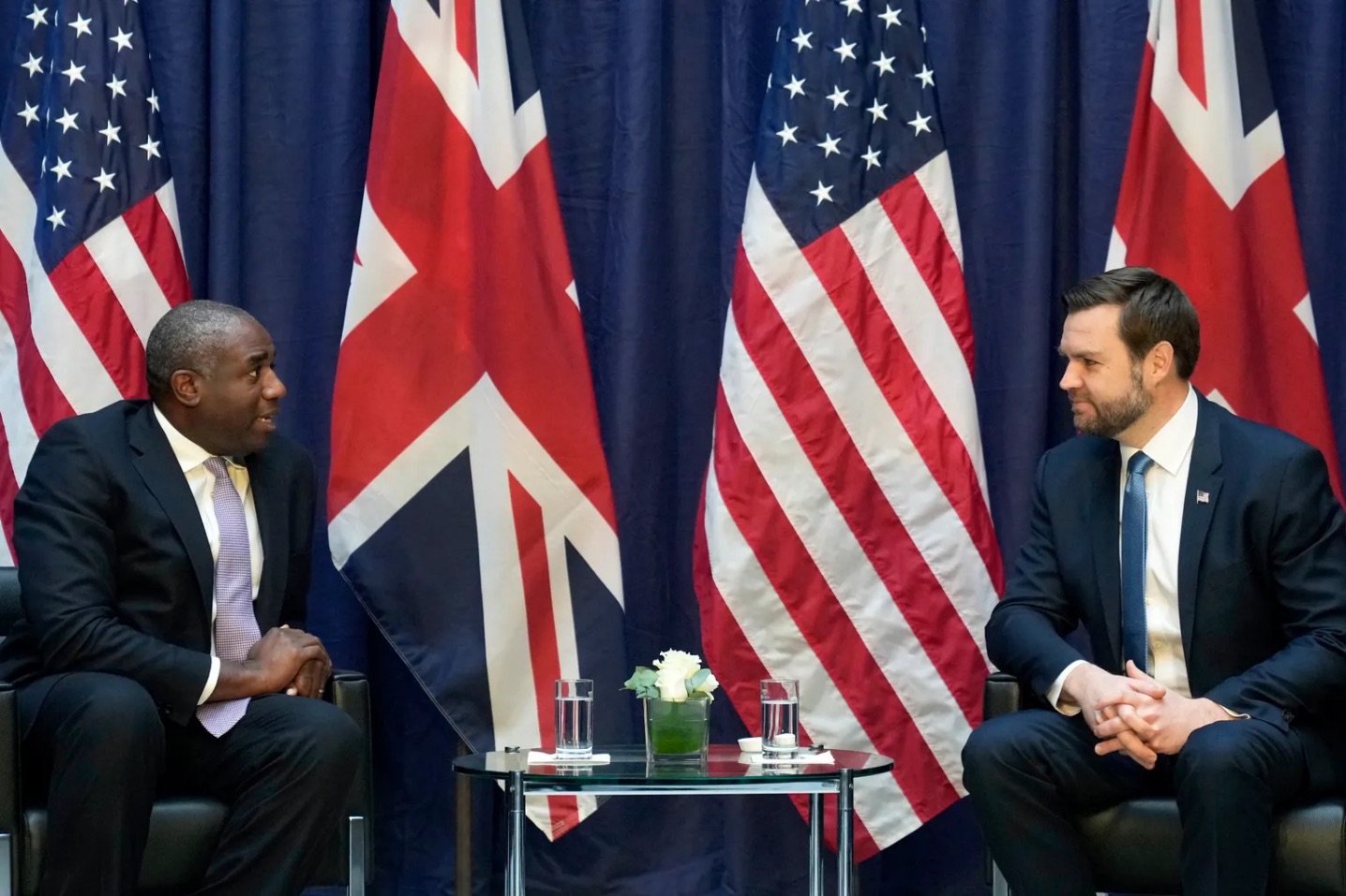 United States Vice-President JD Vance, right, and Britain’s Foreign Secretary David Lammy during a bilateral meeting on the sidelines of the Munich Security Conference in Munich, Germany, Friday, Feb. 14, 2025. | AP Photo/Matthias Schrader